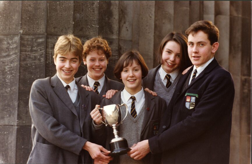 Big hair and bigger smiles in the 1990s.