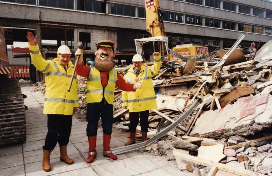Desperate Dan assists in the demolition. 1998.