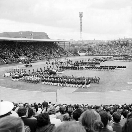 The teams line up on the Meadowbank Stadium pitch during the opening ceremony in 1970.