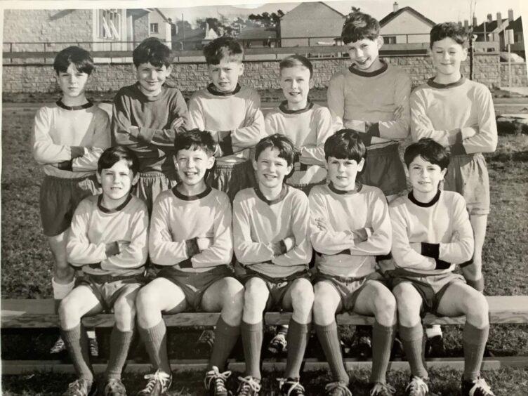 Alan Salisbury, front row far right, with Letham Primary School's football team.