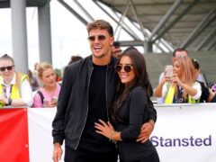 Love Island contestants Luca Bish and Gemma Owen arriving at Stansted Airport after leaving the villa in Majorca (Yui Mok/PA)