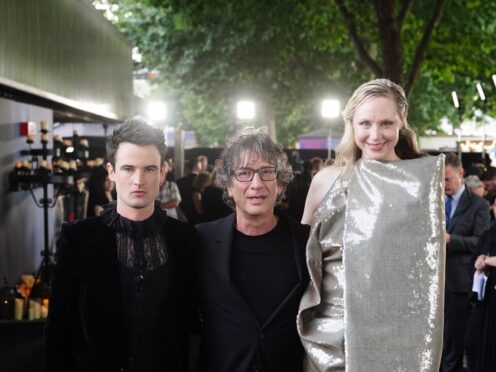 Tom Sturridge, Neil Gaiman and Gwendoline Christie arrives for the world premiere of The Sandman (Ian West/PA)