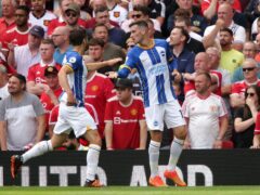 Pascal Gross, right, scored twice as Brighton ensured Erik ten Hag’s first game in charge of Manchester United ended in defeat (Ian Hodgson/PA)