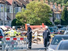 Engineers at the scene of an explosion on Galpin’s Road in Thornton Heath, south London (Dominic Lipinski/PA)