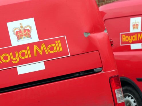 Royal Mail workers have voted to strike in a dispute over terms and conditions (Rui Vieira/PA)