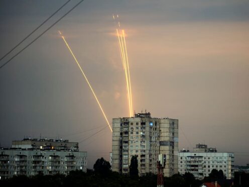 Russian rockets launch against Ukraine from Russia’s Belgorod region are seen at dawn in Kharkiv (Vadim Belikov/AP)