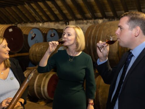 Distilleries production manager Laura Tolmie, Liz Truss and Scottish Conservative Leader Douglas Ross during a campaign visit to the BenRiach Distillery in Speyside, as part of her campaign to be leader of the Conservative Party and the next prime minister (Paul Campbell/PA)
