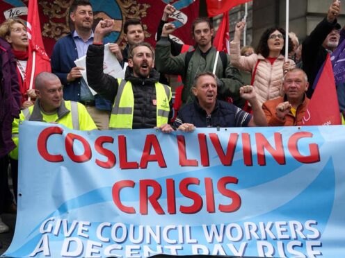 Council workers take part in a rally outside the city chambers in Edinburgh (Andrew Milligan/PA)