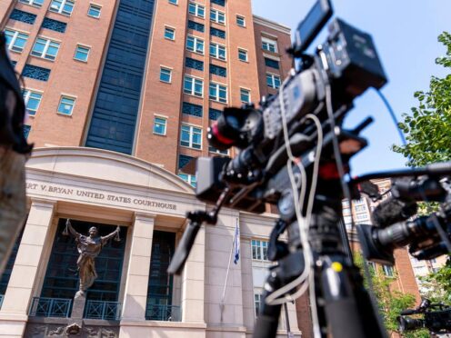 Cameras are set up outside the US District Courthouse before the sentencing of El Shafee Elsheikh (Andrew Harnik/AP)