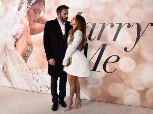 Jennifer Lopez has offered fans a ‘first peek’ at her wedding looks, after officially tying the knot earlier this month (Jordan Strauss/Invision/AP)
