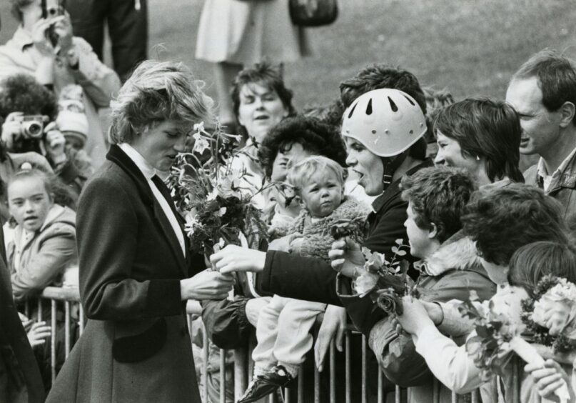 Princess Diana during her visit to Dundee in 1986 where young and old gathered to meet and greet her.