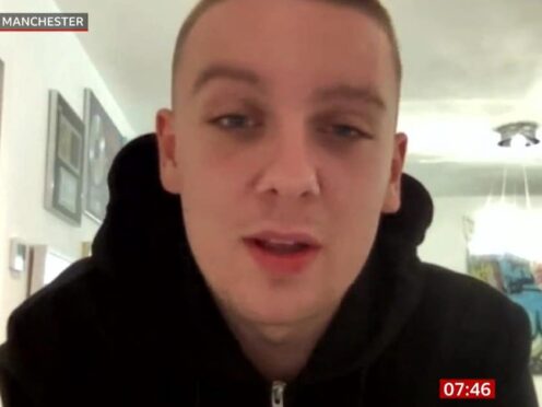 Rapper Aitch has spoken about the moment he realised promotional artwork for his new album had been plastered over a mural of late musician Ian Curtis in Manchester (BBC Breakfast/PA)