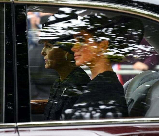 Sophie Countess of Wessex and Meghan Duchess of Sussex travel to Westminster Abbey.