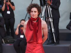 Timothee Chalamet dons red, backless jumpsuit for Venice Film Festival day three (Joel C Ryan/Invision/AP)