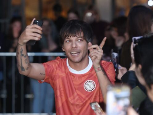 Louis Tomlinson ‘expecting a few texts’ from One Direction after new album launch (James Manning/PA)