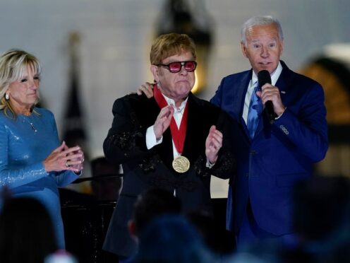 Sir Elton John gave a special performance on the White House lawn to the president and First Lady and around 2000 ‘everyday history makers’ on Friday night (Susan Walsh/AP)