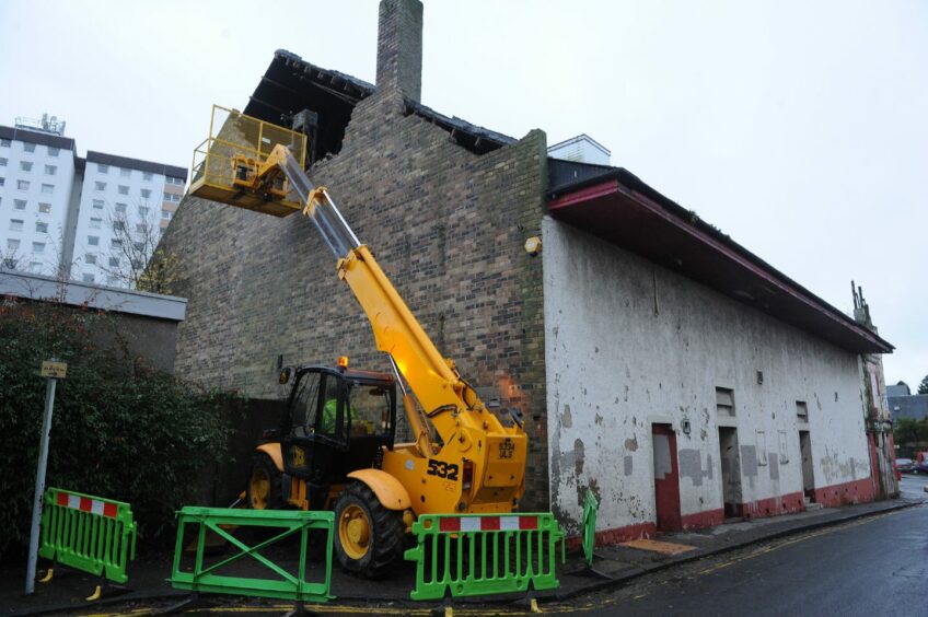 Bulldozers get to work pulling down a piece of Dundee's cinema history.