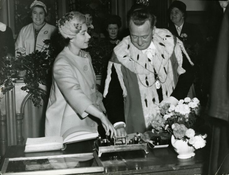 The Queen with Lord Provost John T. Young at Perth Town House in 1960.