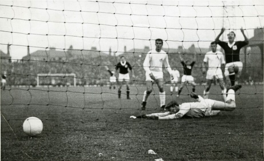 Alan Gilzean gets his first goal against Cologne in 1962. Image: DC Thomson.