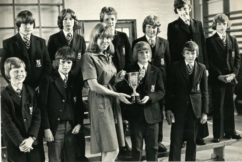 The Grove boys hockey team being presented with Scottish Challenge Trophy in June 1976