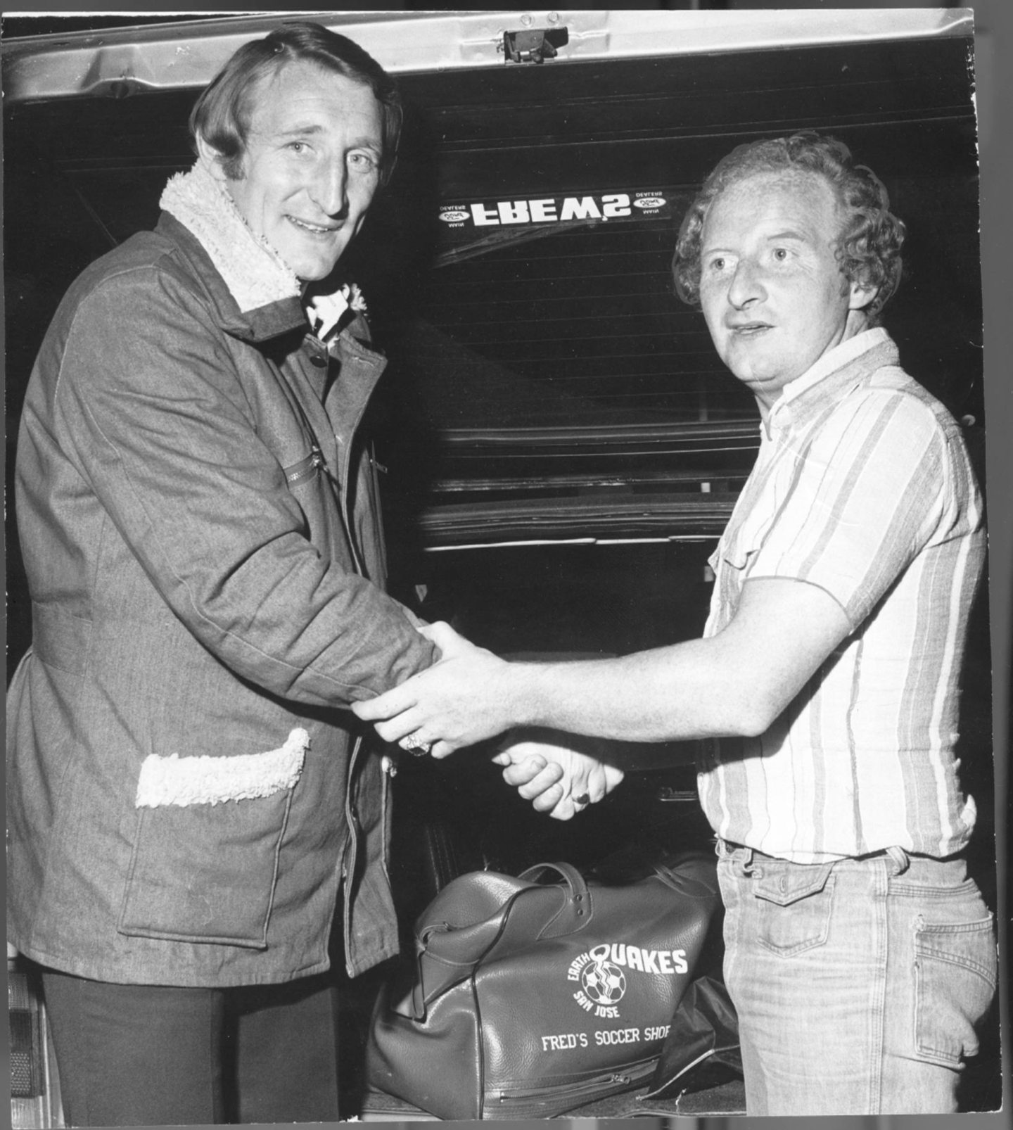 Jimmy Johnstone being greeted by Tommy Gemmell at the Tay Bridge railway station as he arrives to sign for Dundee.