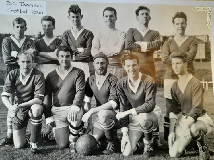 Mick Grahame, back row, fourth from left with a DC Thomson football team.