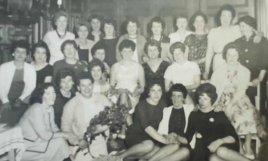 Dottie Gillespie, front row, second right, on a night out in her younger years.