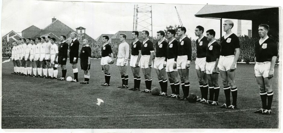 The teams line up for Dundee's first-ever game in European competition.