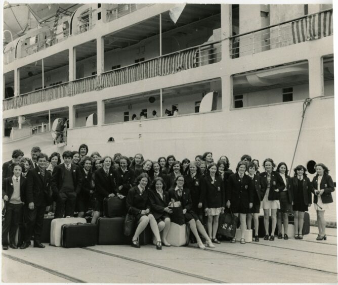 Grove pupils with their suitcases and bags at Dundee docks.