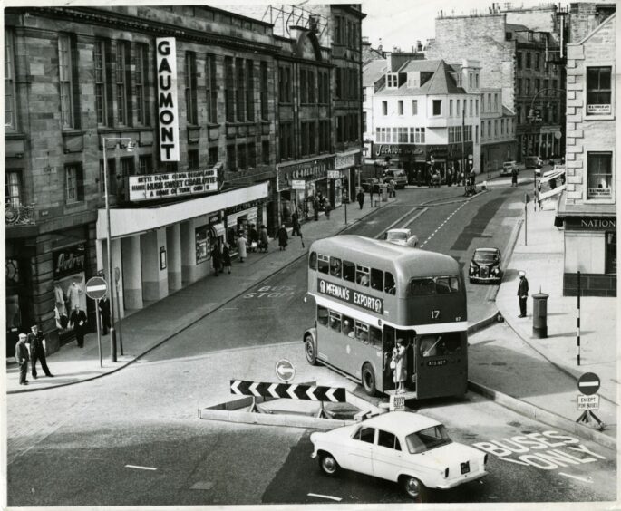 The old Dundee Cowgate with the Gaumont Cinema in view in July 1965. Picture: DC Thomson.