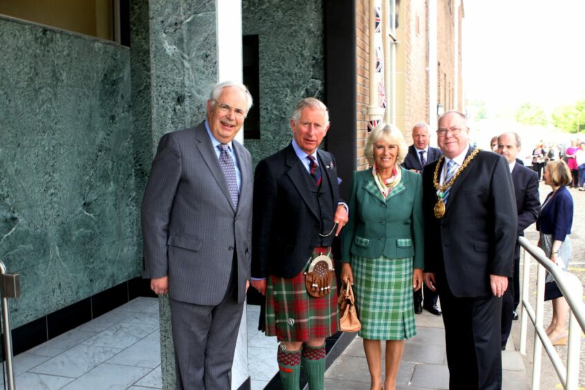 The Duke and Duchess of Rothesay are welcomed by chairman Andrew Thomson and Lord Provost Bob Duncan.