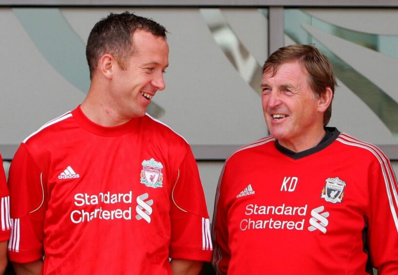 Charlie Adam with manager Kenny Dalglish following his £6.75m move from Blackpool.