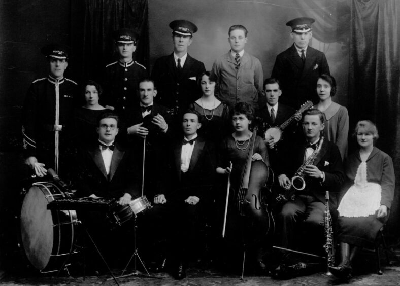 Staff and the orchestra from the Royalty Kinema, which opened in 1919 in Watson Street. Image: Supplied.