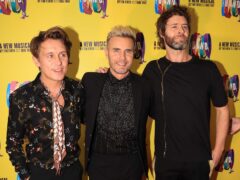Mark Owen, Gary Barlow, and Howard Donald of Take That (Peter Byrne/PA)