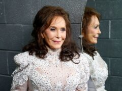 FILE – Loretta Lynn poses for a photo at the Municipal Auditorium in Nashville, Tenn., on Feb. 10, 2016. Lynn, the Kentucky coal miner’s daughter who became a pillar of country music, died Tuesday at her home in Hurricane Mills, Tenn. She was 90. (Photo by Donn Jones/Invision/AP, File)
