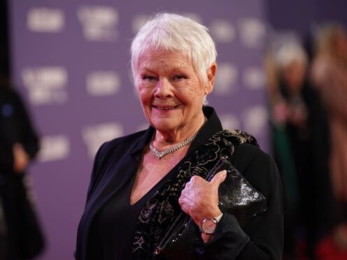 Dame Judi Dench has criticised The Crown for ‘crude sensationalism’ (Yui Mok/PA)