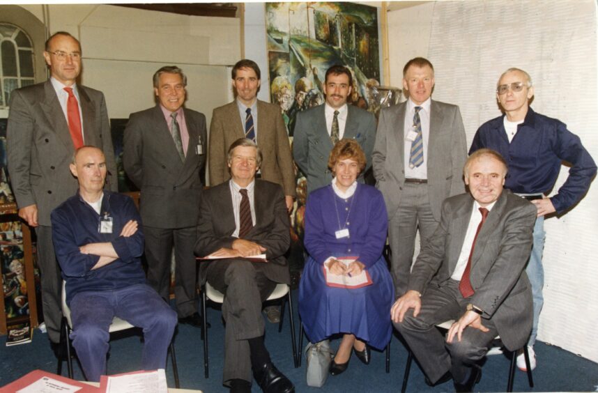 Governor Ron Kite, seated, right, with delegates at the HMP Perth conference including Mone, far right