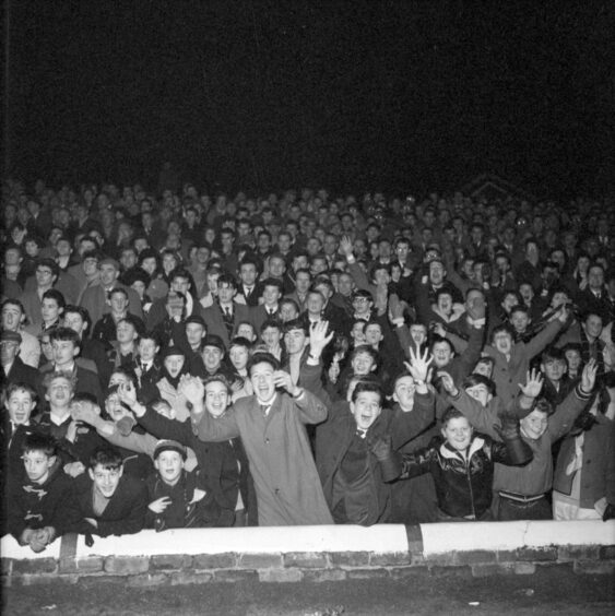 Jubilant young supporters at Dens Park when the team scored four against Sporting Lisbon. Image: DC Thomson.