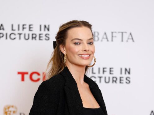 LONDON, ENGLAND – NOVEMBER 22: Margot Robbie at ‘BAFTA: A Life in Pictures with Margot Robbie’, supported by TCL Mobile at BAFTA’s 195 Piccadilly headquarters on November 22, 2022 in London, England. (Photo by John Phillips/Getty Images)
