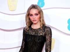 Lily-Rose Depp has spoken about the challenges of growing up with famous parents (Ian West/PA)