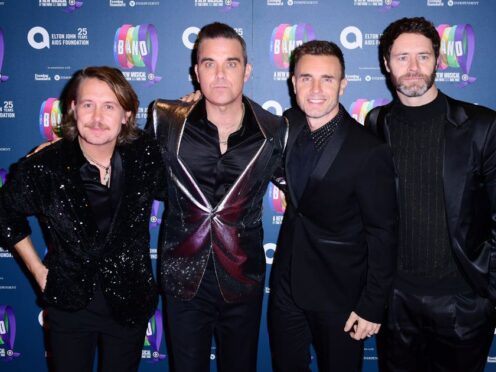 Mark Owen, Robbie Williams, Gary Barlow and Howard Donald of Take That (Ian West/PA)