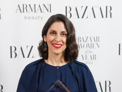 Nazanin Zaghari-Ratcliffe with the Inspiration Award, presented by Elif Shafak at the Harper’s Bazaar Women of the Year 2022 awards (Ian West/PA)