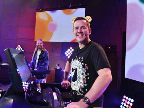 BBC Radio 2 presenter Scott Mills, pictured with singer Sam Ryder, when Mills started his Great Scott TreadMills Challenge to raise money for Children In Need (BBC/PA)