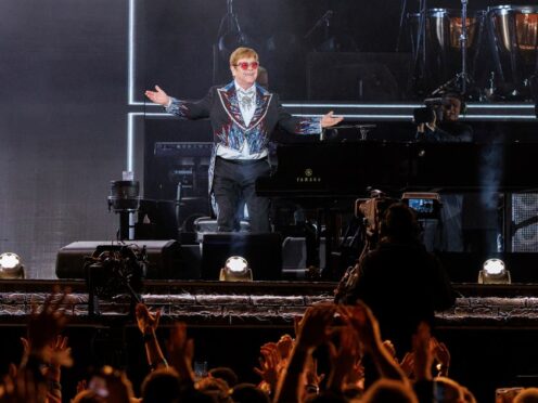 Sir Elton John performs live at the Elton John’s final North American show of his “Farewell Yellow Brick Road” tour on Sunday, Nov. 20, 2022, at the Dodger Stadium in Los Angeles. (Photo by Willy Sanjuan/Invision/AP)
