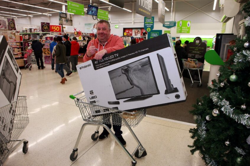 Jimmy Young with his bargain big flat screen television purchase on Black Friday.