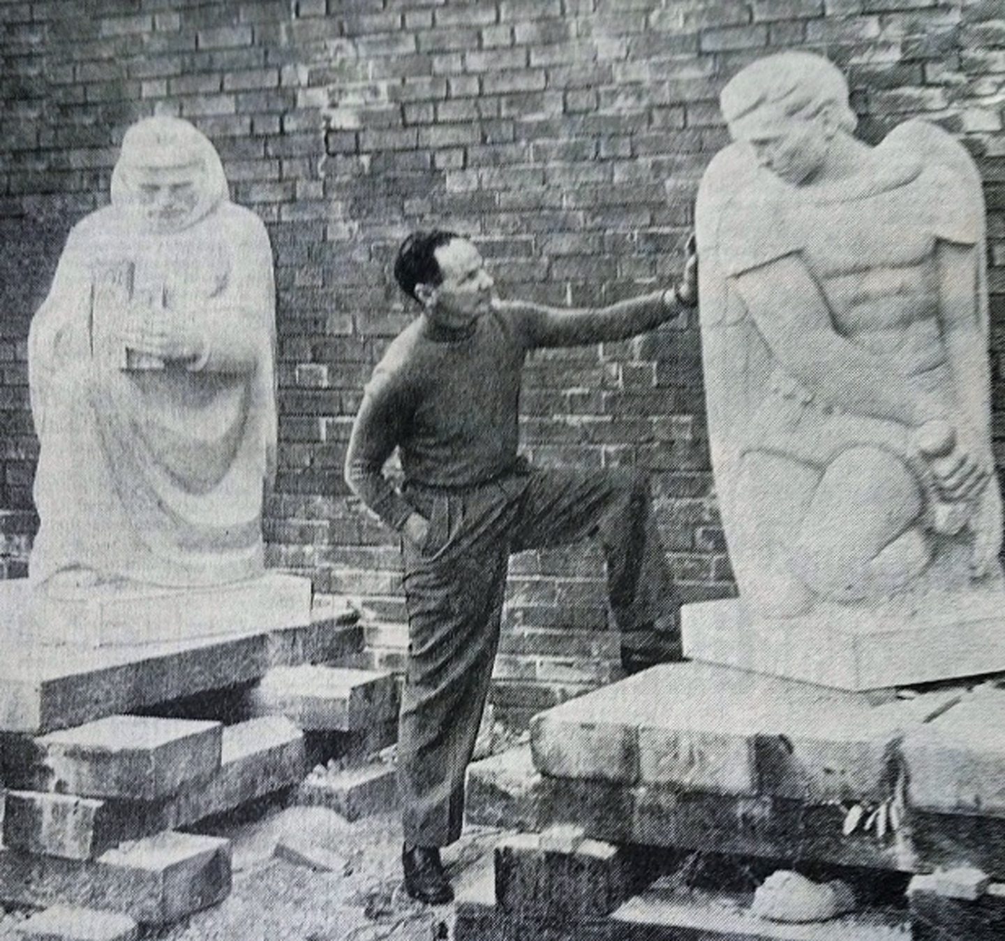 The statues outside the school before the opening with art college lecturer Scott Sutherland. St Michael's School, Dundee. Image: Supplied by BNA.