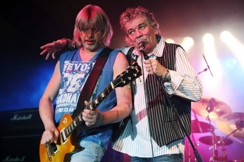 Jimmy Murrison and Dan McCafferty performing on stage with Nazareth in 2008