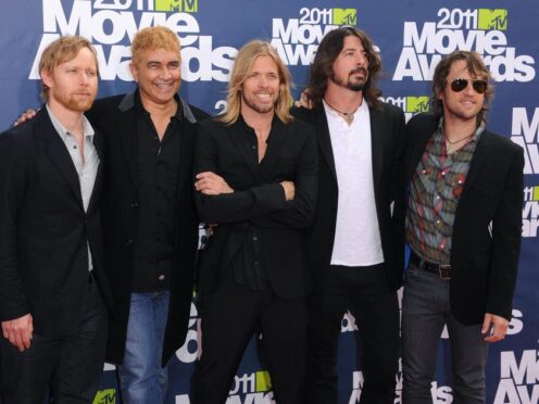 Foo Fighters (from left to right) Nate Mendel, Pat Smear, Taylor Hawkins, Dave Grohl and Chris Shiflett at the MTV Movie Awards 2011 at the Gibson Amphitheatre in Universal City, Los Angeles.