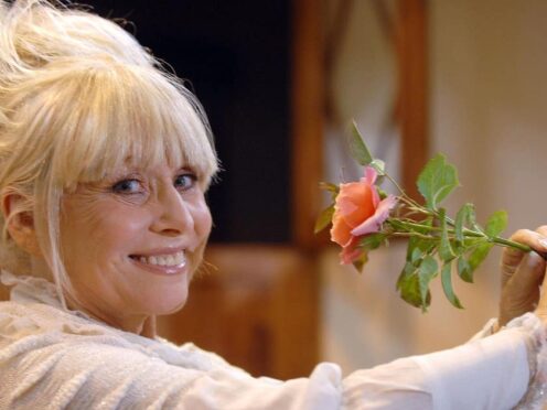 Barbara Windsor with a rose named for her at the BBC Gardeners’ World Live show (PA)