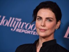 Charlize Theron: Women in industry need to keep using our voices and platforms (Jordan Strauss/AP)